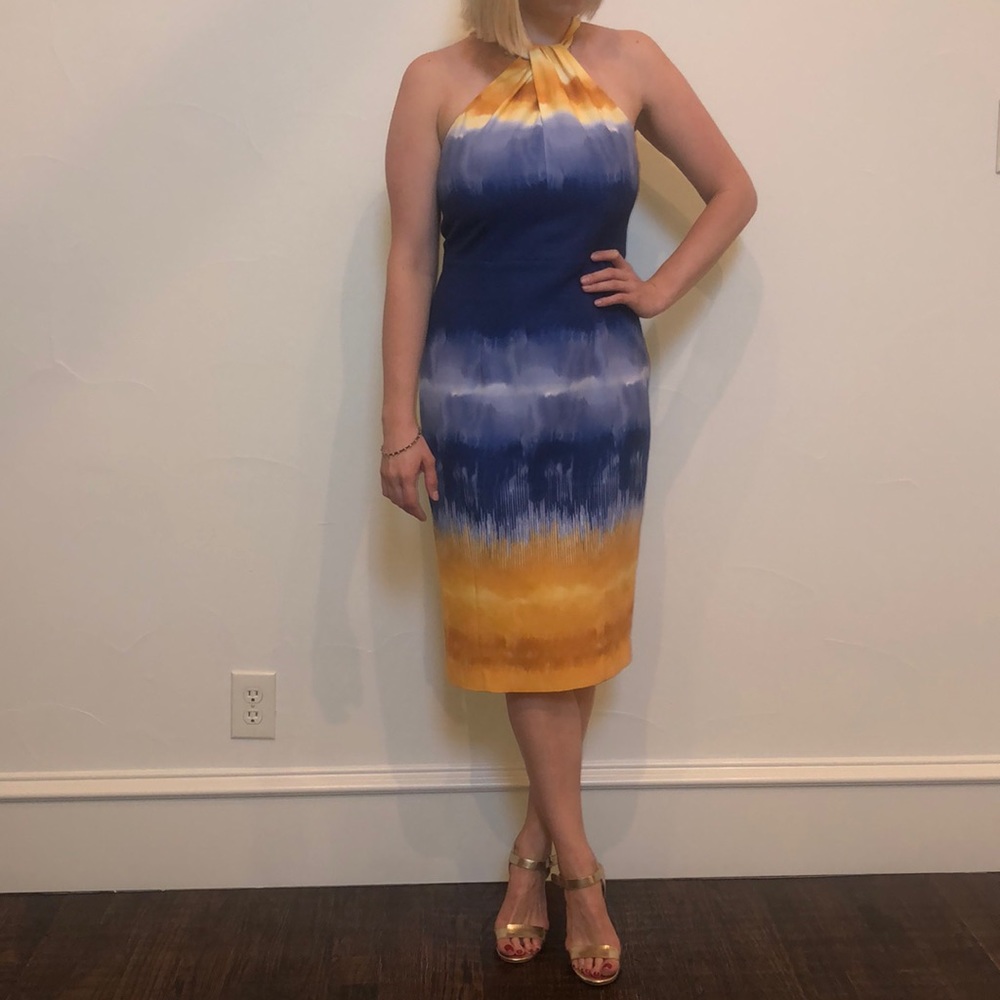 Yellow and gold midi dress with a slit in the back